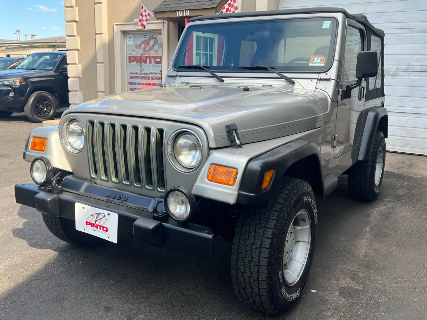 2001 SILVER Jeep Wrangler Sport (1J4FA49S21P) with an 4.0L L6 OHV 12V engine, located at 1018 Brunswick Ave, Trenton, NJ, 08638, (609) 989-0900, 40.240086, -74.748085 - Photo#0